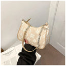 Cartera Baguette Flores 3D · Cadena Plateada