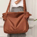 bolso organizador plegable impermeable de tela Oxford detalle de tela, costuras y correas