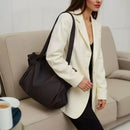bolso organizador plegable impermeable de tela Oxford llevado al hombro, escala real