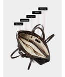 Interior organizado de bolso tote con tres compartimentos y bolsillo para celular