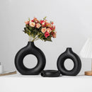 Florero nórdico decorativo de plástico con detalle de boca redondeada y pulido