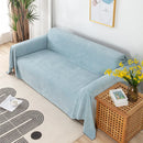Funda impermeable para sofá azul aqua antideslizante en living minimalista
