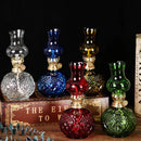 Lámpara de aceite vintage de vidrio en colores verde, ámbar y transparente