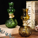 Lámpara de aceite vintage de vidrio con base texturizada y acabado clásico