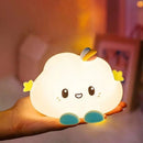 Lámpara nocturna nube cute portátil en la mano, tamaño real