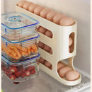 Organizador de huevos automático para heladera dispensando un huevo uno por uno
