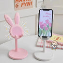 Soporte de celular conejo ajustable en escritorio, ideal para videollamadas y series