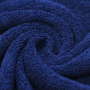 Toalla de algodón 100% bordada, detalle jacquard y textura de rizo
